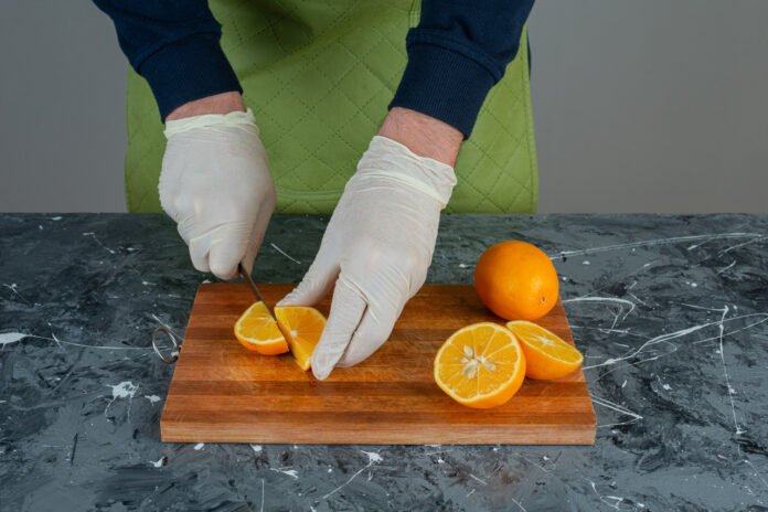 When are food workers required to change gloves